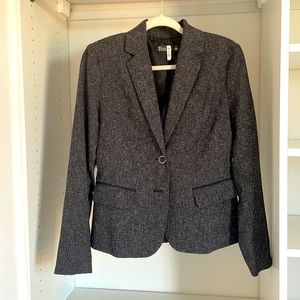 Freshly dry cleaned grey blazer